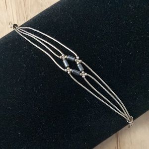 Sterling braided liquid silver Hematite 4 strand 7" bracelet